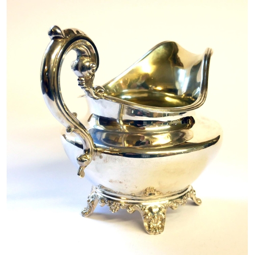 435 - A WILLIAM IV SILVER CREAM JUG
Having a scrolled handle and gilt interior, hallmarked Hoseph and Albe... 