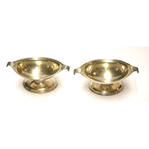 446 - A PAIR OF GEORGIAN SCOTTISH SILVER NAVETTE FORM SALTS
With twin reeded handles, hallmark Thistle wit... 