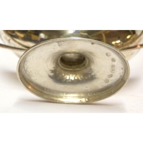 448 - A PAIR OF GEORGIAN SILVER NAVETTE FORM SALTS
With twin handles and gilt interior and engraved crest ... 