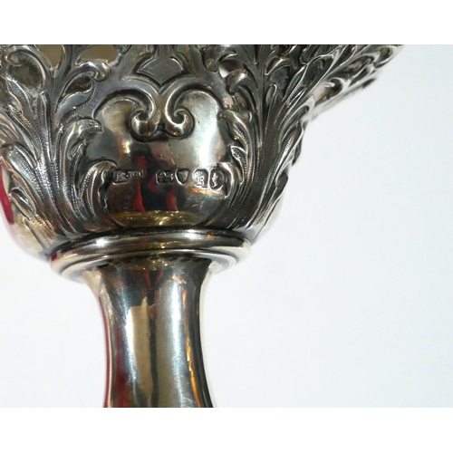 461 - A VICTORIAN SILVER AND CRANBERRY GLASS SWEETMEAT TAZZA
Having pierced as scrolled decoration and gla... 