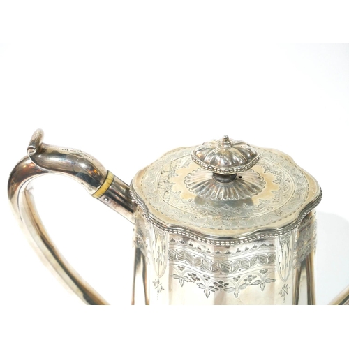 511 - A VICTORIAN SILVER COFFEE POT
Fluted form with bright cut engraving, hallmarked London, 1892.
(appro... 