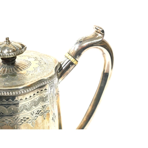 511 - A VICTORIAN SILVER COFFEE POT
Fluted form with bright cut engraving, hallmarked London, 1892.
(appro... 