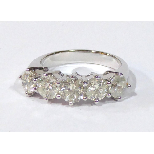 535 - AN IMPRESSIVE 18CT WHITE GOLD RING SET WITH FIVE DIAMONDS 
(size M).
(2.5ct in total) (colour H, S2)