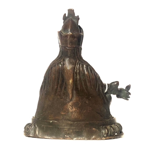 574 - AN ANTIQUE NEPALESE-TIBETAN BRONZE FIGURE OF BUDDHA AMITAYUS
Wearing a long Monks robe and tiara, hi... 