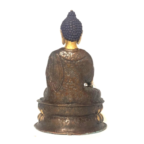 576 - A LATE 19TH/EARLY 20TH CENTURY SINO-TIBETAN GILT BRONZE BUDDHA OF SAKYAMUNI 
Seated, meditating in V... 