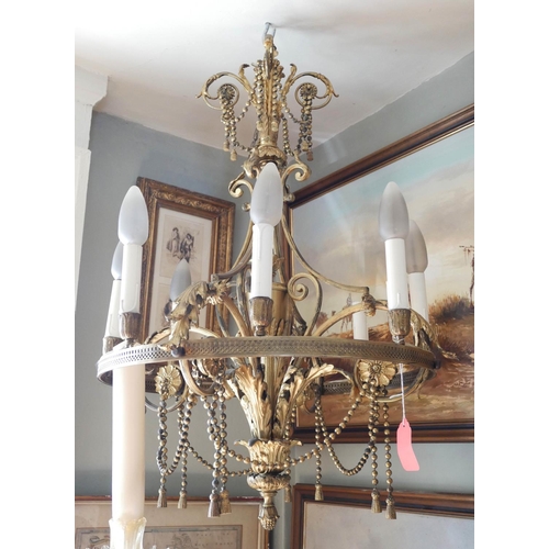 577 - 19TH CENTURY FRENCH NEOCLASSICAL GILT BRONZE AND ORMOLU EIGHT BRANCH CHANDELIER
Decorated with swags... 