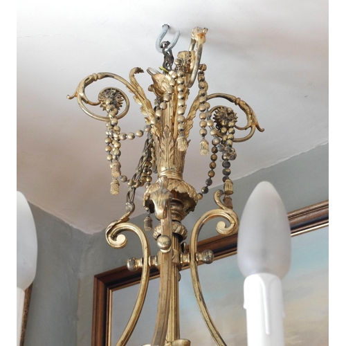 577 - 19TH CENTURY FRENCH NEOCLASSICAL GILT BRONZE AND ORMOLU EIGHT BRANCH CHANDELIER
Decorated with swags... 