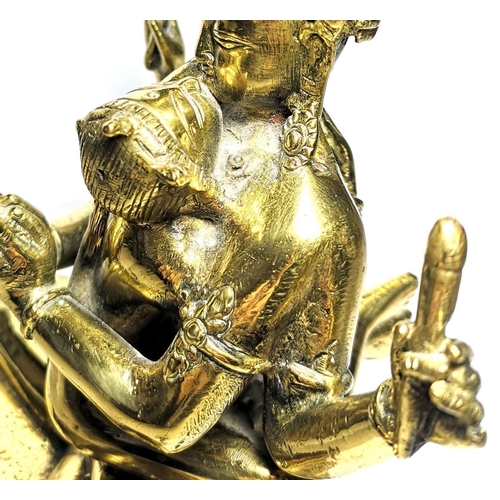 578 - A 19TH CENTURY POLISHED BRONZE BUDDHA
Modelled as Chakrasamvara and Vagragogini in seated kissing po... 