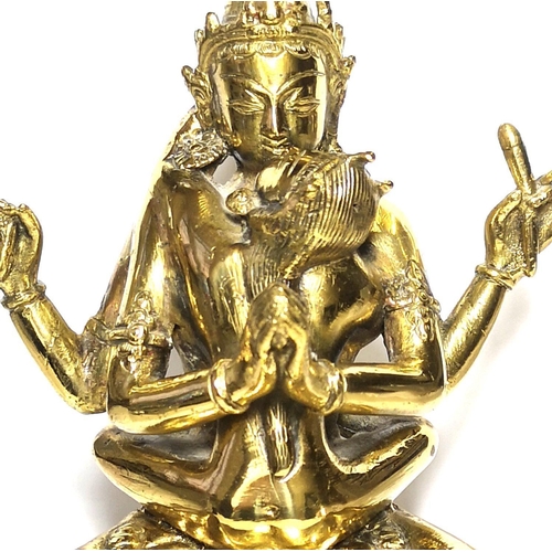 578 - A 19TH CENTURY POLISHED BRONZE BUDDHA
Modelled as Chakrasamvara and Vagragogini in seated kissing po... 