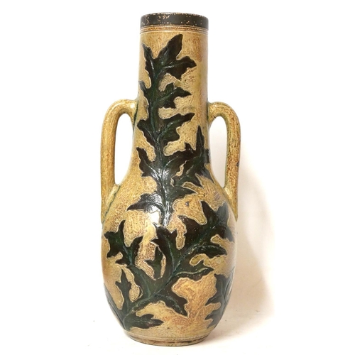 583 - MARTIN BROTHERS, BRITISH, ESTABLISHED 1873, A LARGE STONEWARE GLAZED TWIN HANDLED VASE
With incised ... 