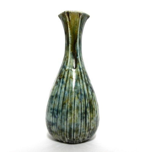 591 - MARTIN BROTHERS, BRITISH, ESTABLISHED 1873, A STONEWARE GLAZED SLENDER NECK VASE
With ribbed body, s... 