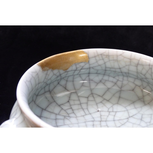 604 - A LATE 18TH/EARLY 19TH CENTURY CHINESE CELADON CRACKLE GLAZE CENSER
Having twin handles and gilt dec... 