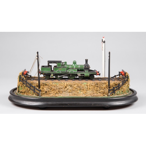 243 - A 20TH CENTURY STEAM TRAIN MODEL DIORAMA UPON VICTORIAN EBONISED PLINTH.
(l 28cm)