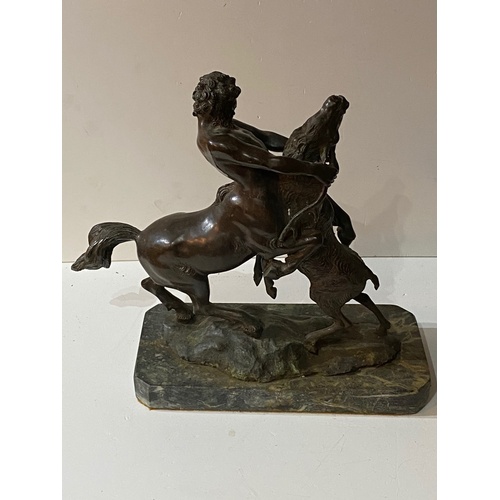 552a - A 19TH CENTURY BRONZE STATUE CENTAUR 
On green marble base.
(37cm x 34cm)