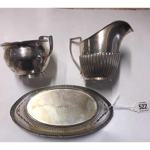 522 - A COLLECTION OF VICTORIAN AND LATER SILVER WARE
Including a classical form with pierced decoration a... 