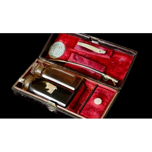 664 - MCLELLAN BROS, WHITECHAPEL, A VICTORIAN CASED MEDICAL INSTRUMENT SET
Comprising two glass bottles an... 