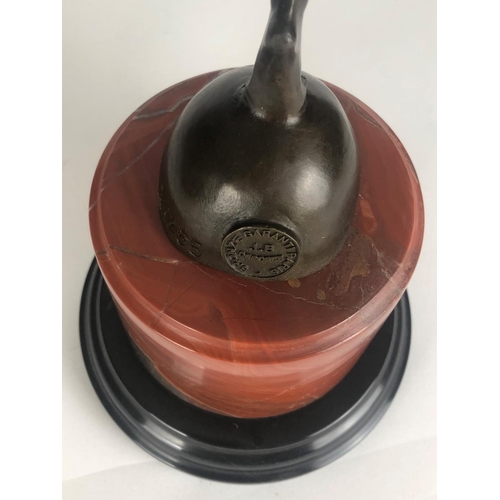 676 - AN ART DECO STYLE BRONZE STATUE OF A SEMICLAD FEMALE DANCER
On circular rouge and black marble base.... 