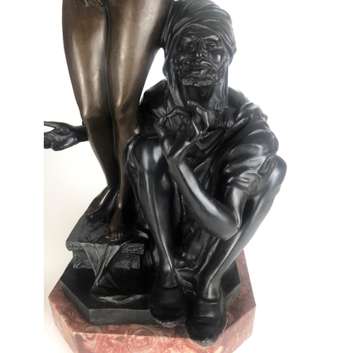 677 - AN ART NOVEAU STYLE BRONZE STATUE OF A NUDE SLAVE GIRL WITH HER MASTER
On rouge marble base.
(70cm)
... 