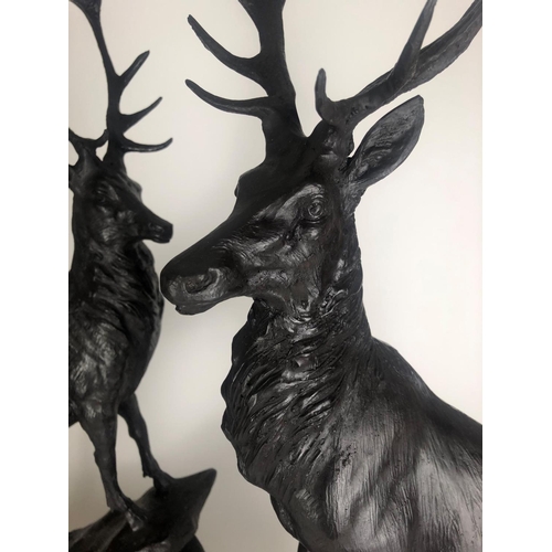 678 - A PAIR OF BRONZE STATUES
Royal stags, on black marble oval base.
(74cm)

Condition: good throughout