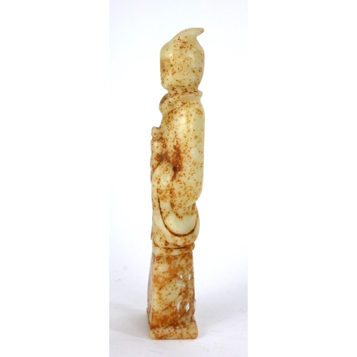 698 - A CHINESE HARDSTONE CARVINGS OF AN ELDER
Standing pose with long robes and holding a book.
(approx 1... 