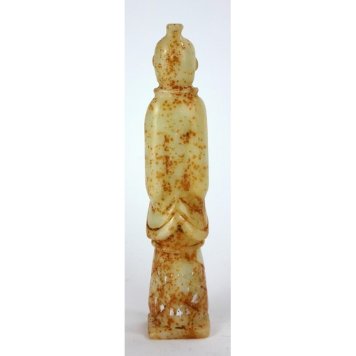 698 - A CHINESE HARDSTONE CARVINGS OF AN ELDER
Standing pose with long robes and holding a book.
(approx 1... 