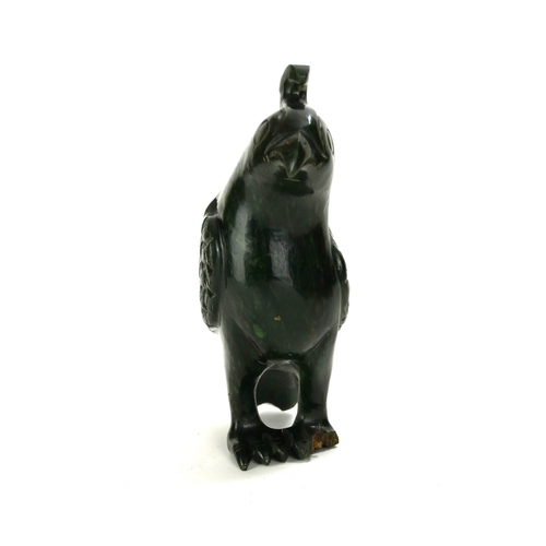 702 - A CHINESE CARVED HARDSTONE BIRD SCULPTURE
Standing pose with carved plumage.
(approx 18cm)
