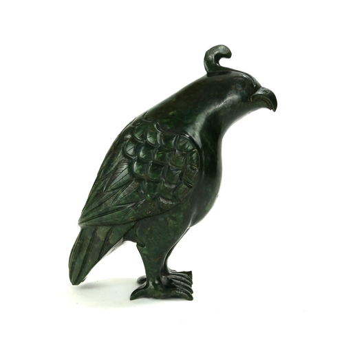 702 - A CHINESE CARVED HARDSTONE BIRD SCULPTURE
Standing pose with carved plumage.
(approx 18cm)