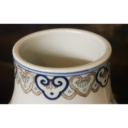 729 - A LARGE CHINESE DOUBLE GOURD VASE 
Famille verte decoration, in the form of maidens in garden settin... 