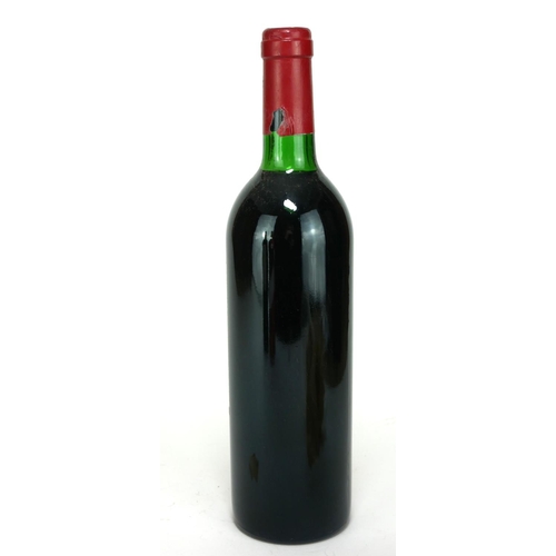 747 - CHÂTEAU LATOUR, 1983, PREMIER GRAND CRU CLASSÉ PAUILLAC, A VINTAGE GILT LABEL BOTTLE OF RED WINE.