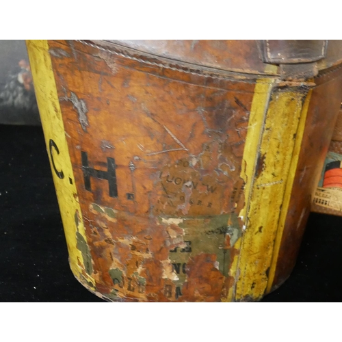 748 - A VINTAGE LEATHER HAT BOX
Along with two suit vases, bearing numerous labels.