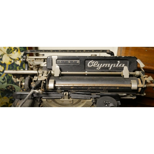 762 - A VINTAGE OLYMPIA TYPEWRITER.