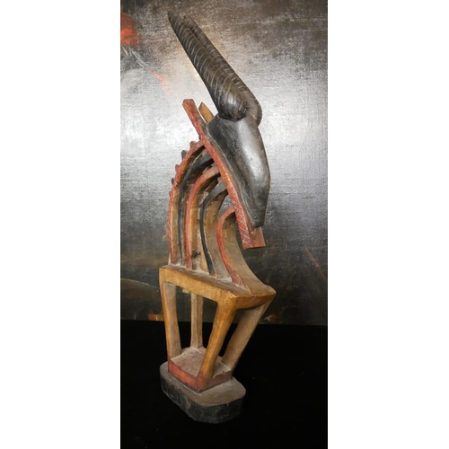 763 - A LARGE 20TH CENTURY AFRICAN WOODEN ASHANTI TRIBAL ART CARVING
Animal carving with two horns and geo... 
