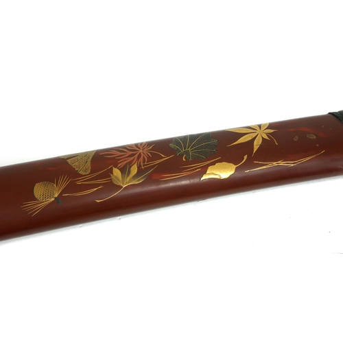 766 - A JAPANESE TANTO DAGGER
Having a shark skin handle set with gilt bronze fuchi and mounts, the dark r... 