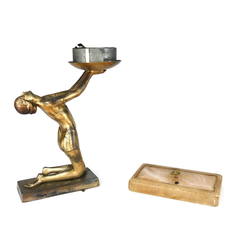 769 - AN ART DECO SPELTER AND ONYX FIGURAL LAMP
Seminude female in kneeling pose, on a rectangular onyx ba... 