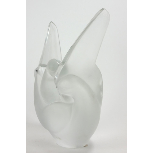 787 - LALIQUE, A LARGE FROSTED GLASS FIGURAL VASE
Titled 'Sylvie', having two entwined doves with label to... 