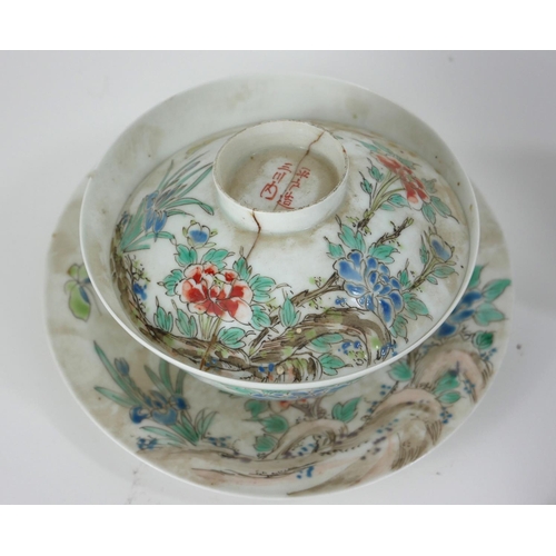 798 - A CHINESE TURQUOISE AND MANGANESE GLAZED PORCELAIN FIGURE OF A HOHO BIRD
Perched on a pierced organi... 