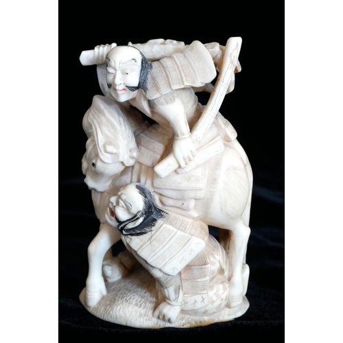 803 - A JAPANESE IVORY STATUE, SAMURAI ON HORSEBACK.
(8.5cm)