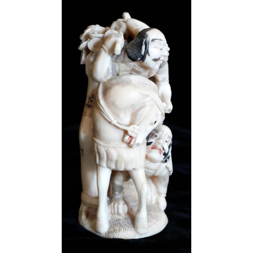 803 - A JAPANESE IVORY STATUE, SAMURAI ON HORSEBACK.
(8.5cm)