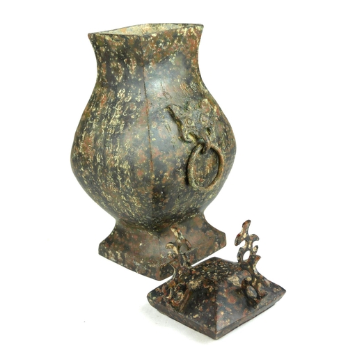 242 - AN ARCHAIC FORM BRONZE CHINESE BALUSTER VASE AND COVER 
Engraved with script.
(h 29cm)