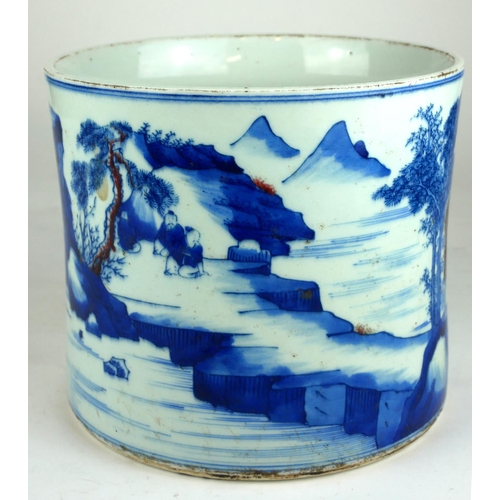 243 - A LARGE CHINESE BLUE AND WHITE BRUSH POT 
Decorated with figures and fisherman in a landscape, beari... 