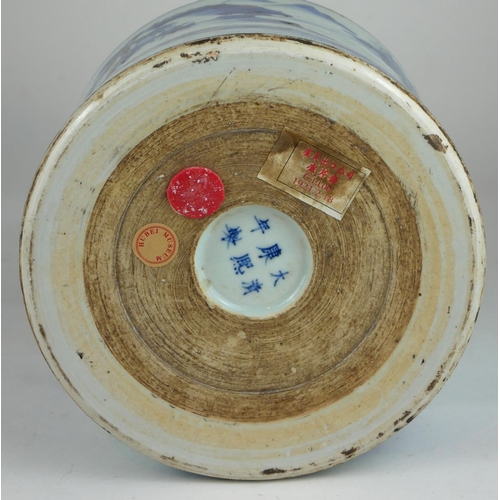 243 - A LARGE CHINESE BLUE AND WHITE BRUSH POT 
Decorated with figures and fisherman in a landscape, beari... 