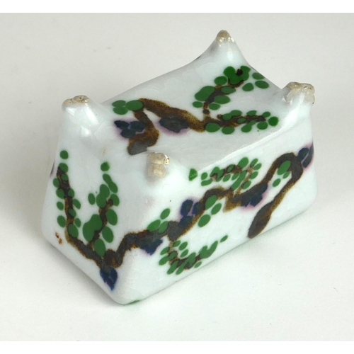 244 - A RARE AND UNUSUAL CHINESE PORCELAIN RECTANGULAR BRUSH POT
With six holes and hand painted decoratio... 