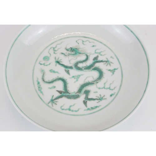 248 - A CHINESE FAMILLE VERTE DRAGON BOWL
Having a five toe dragon chasing a flaming pearl, bearing a red ... 