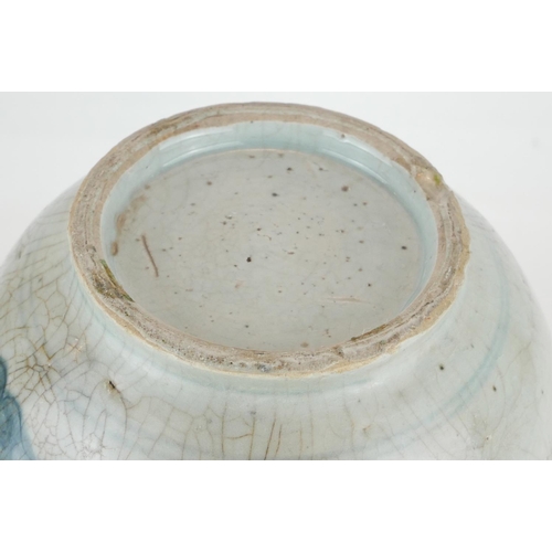 254 - A CHINESE PROVINCIAL MING PERIOD RICE WINE JUG
Decorated with a four toe dragon on a pale blue groun... 