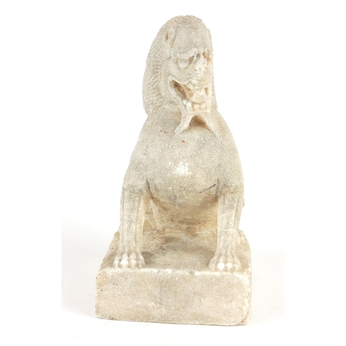 258 - A CHINESE CARVED STONE TEMPLE LION
Seated pose with grotesque features, on a square plinth.
(approx ... 