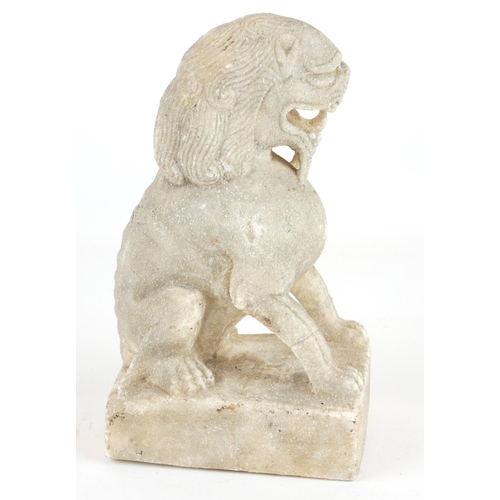 258 - A CHINESE CARVED STONE TEMPLE LION
Seated pose with grotesque features, on a square plinth.
(approx ... 