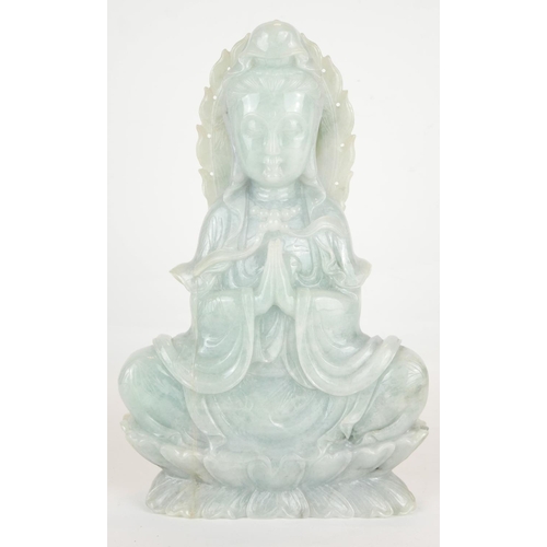 259 - A LARGE CHINESE CARVED PALE GREEN JADE FIGURE OF QUAN YIN
Seated pose, on a double lotus base.
(appr... 