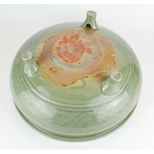 265 - A LARGE MING DYNASTY 1368 - 1644 LONGQUAN CELEDON GLAZED TRIPOD CENSER
Having a geometric design to ... 