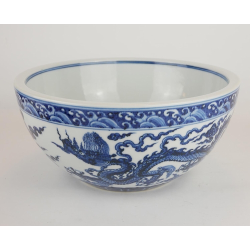 268 - A CHINESE BLUE AND WHITE PORCELAIN 'DRAGON' BOWL
Hand painted decoration of a five toe dragon in sty... 