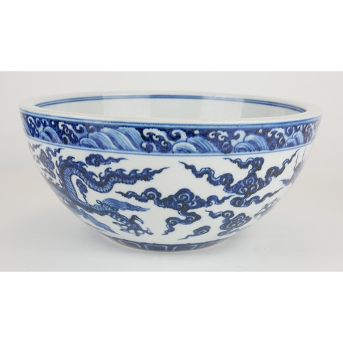 268 - A CHINESE BLUE AND WHITE PORCELAIN 'DRAGON' BOWL
Hand painted decoration of a five toe dragon in sty... 